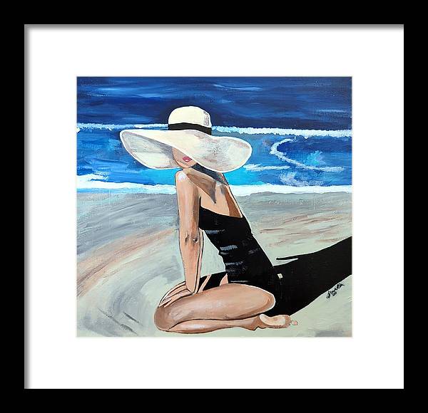 Kneeling in sand - Framed Print